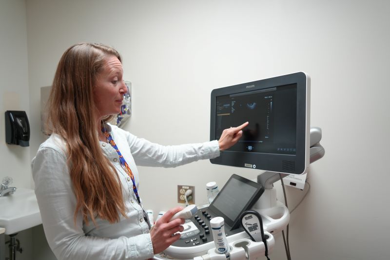 Dr. Erin Lorencz, an ob-gyn at the Gallup Indian Medical Center, points to a monitor