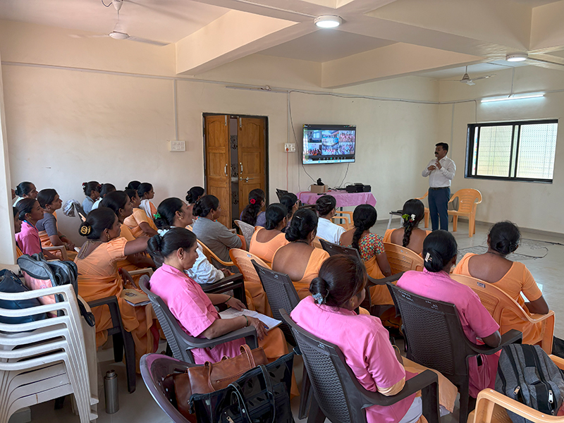 Community health workers participating in an in-person hypertension training session led by ECHO India.