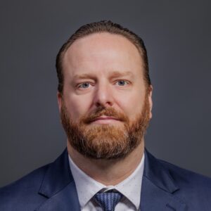 Headshot of Daniel Rowan.