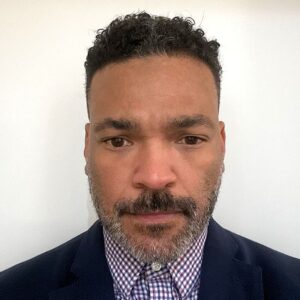 Headshot of Che Parker.