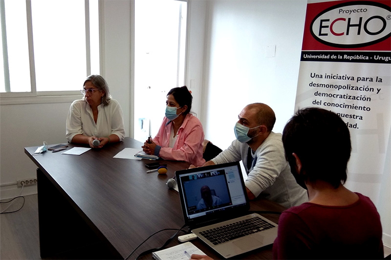 Close up shot of a gloved hand holding a syphilis test.