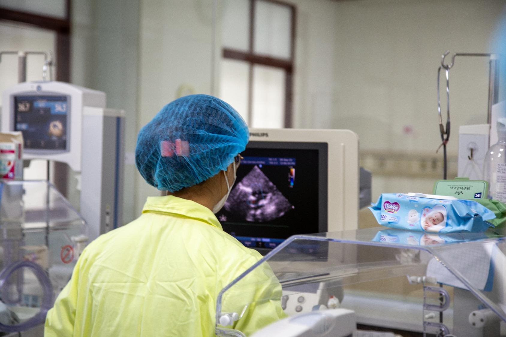 Doctor examines ultrasound in Vietnam