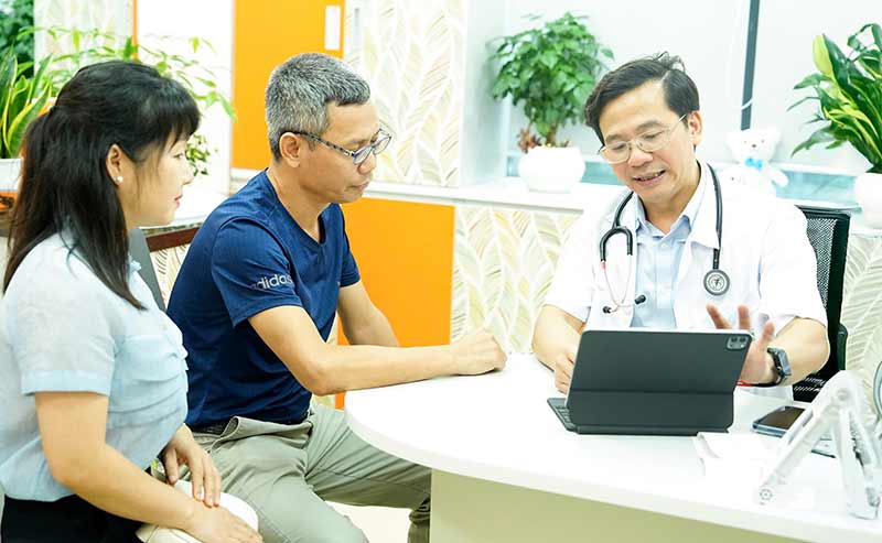Close up shot of a gloved hand holding a syphilis test.