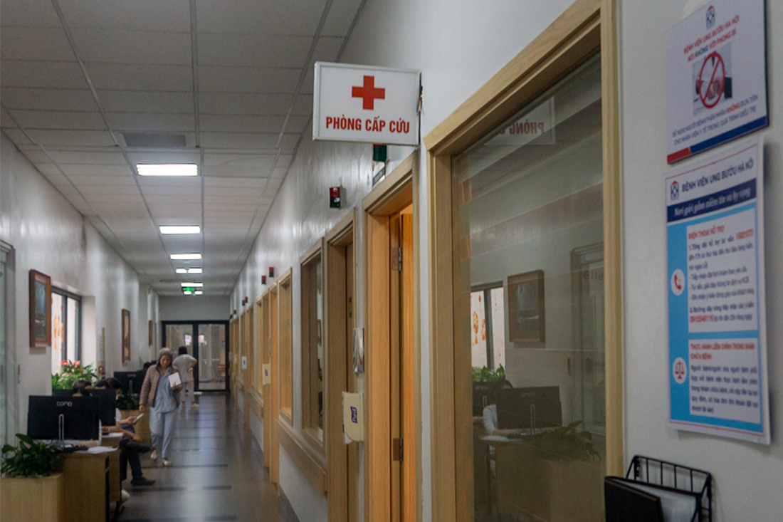 A hospital hallway with signage in Vietnamese